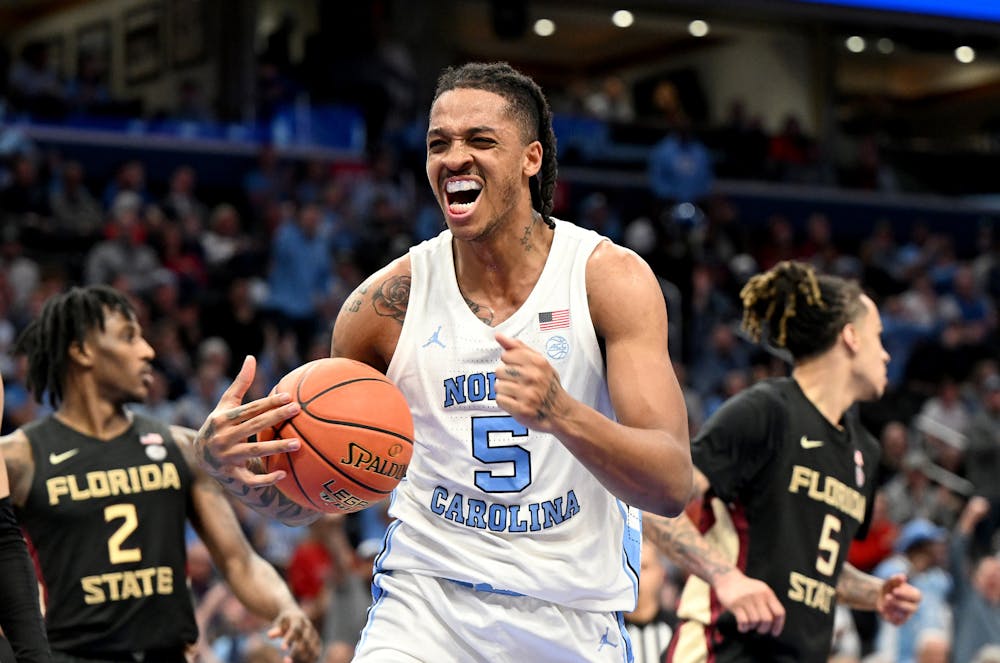 North Carolina's Armando Bacot, middle, celebrates in the first half against Florida State during the quarterfinals of the ACC Tournament at Capital One Arena on Thursday, March 14, 2024, in Washington, D.C. (Greg Fiume/Getty Images/TNS)