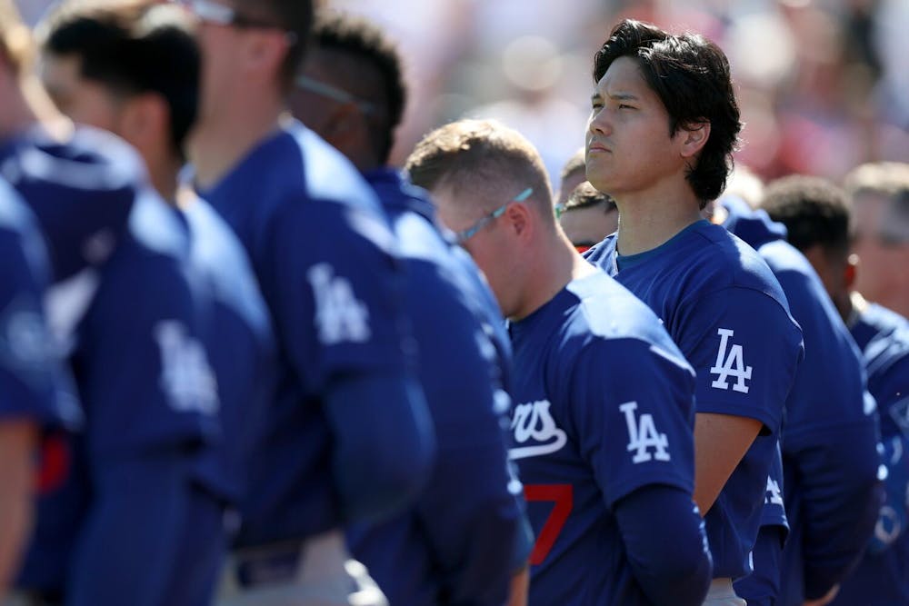 Los Angeles Dodgers two-way player Shohei Ohtani (17) during the national anthem at Diablo Stadium, Tempe, Arizona on Feb. 21, 2026. (Eric Thayer/Los Angeles Times/TNS)