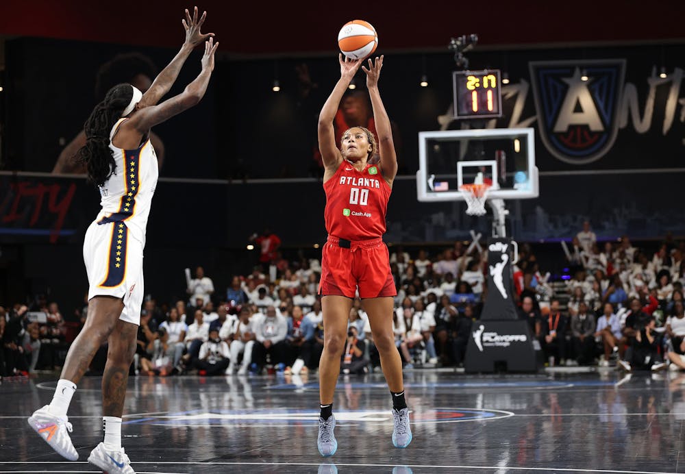 Naz Hillmon (00) of the Atlanta Dream shoots a three-point basket against the Indiana Fever during the fourth quarter of Game 1 of the first round of WNBA Playoffs at Gateway Center Arena on Sunday, Sept. 14, 2025, in College Park, Georgia. (Kevin C. Cox/Getty Images/TNS)
