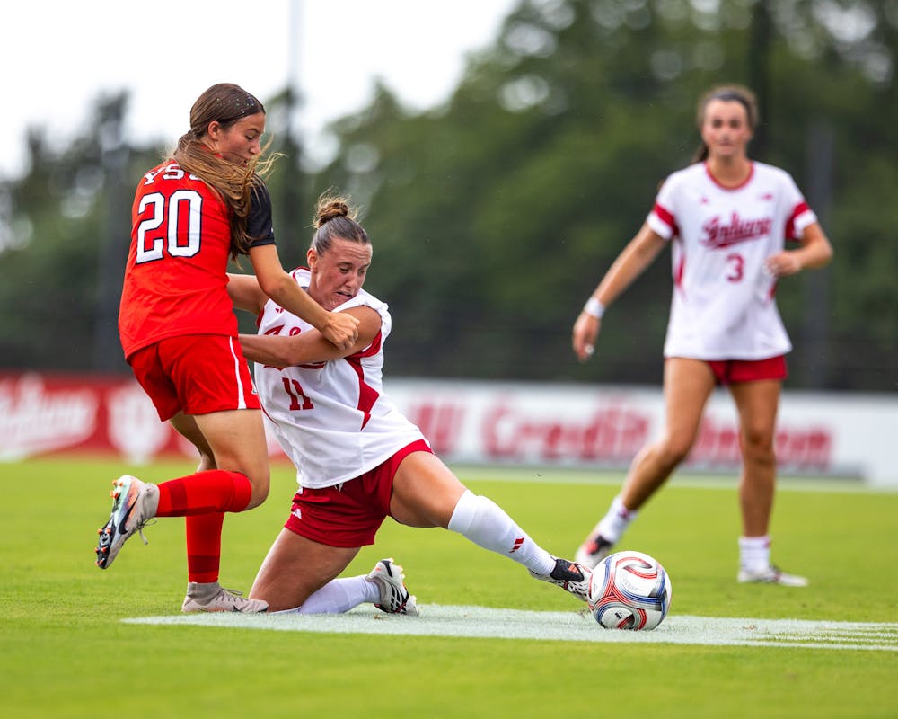 Jenna Chatterton (11) battles for possession during Indiana's win over Youngstown State on Aug. 16, 2026. (HN photo/Lauren McKinney)