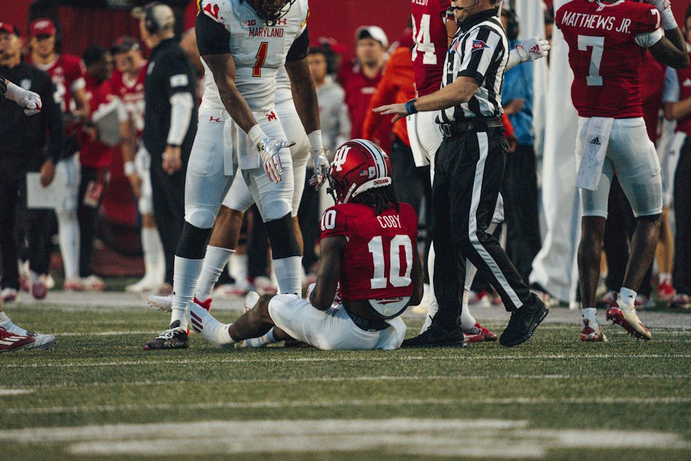 <p>Andison Coby sits on the field after fumbling the football. Maryland recovered the football and scored to secure its 38-33 victory of Indiana on Saturday.﻿</p>