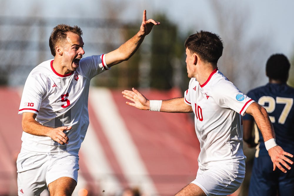 Jansen Miller (left) and Tommy Mihalic celebrate Miller's game-winning goal in Indiana's 2-1 victory against Akron in the NCAA Tournament on Nov. 24, 2024. (HN photo/Kallan Graybill)