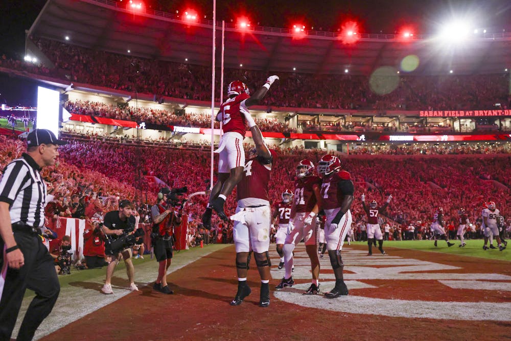 Alabama wide receiver Germie Bernard (5) celebrates his rushing touchdown during the first quarter against Georgia at Bryant-Denny Stadium, Saturday, Sept. 28, 2024, in Tuscaloosa, Al. (Jason Getz / AJC)