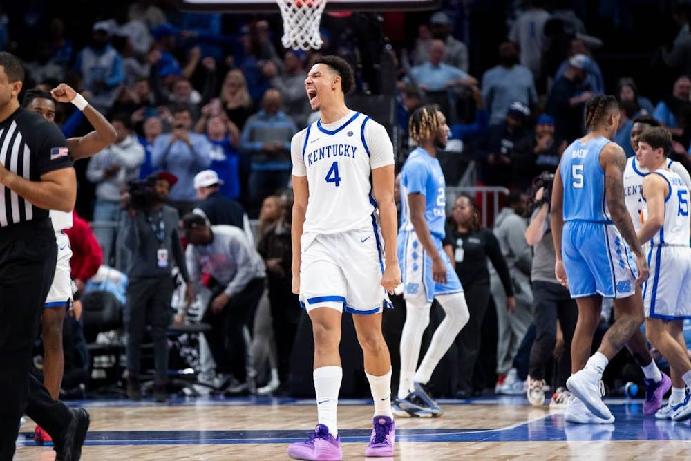 Kentucky Wildcats forward Tre Mitchell (4) celebrates defeating the North Carolina Tar Heels in the CBS Sports Classic on Saturday. Mitchel had eight points in the UK win. (Silas Walker/Tribune Content Agency)