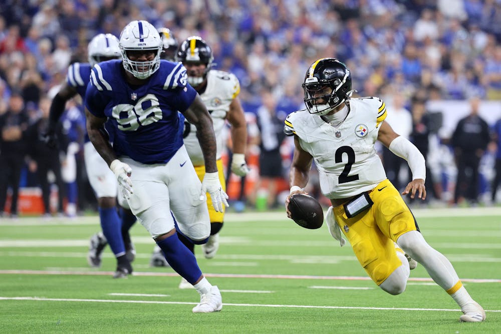 Justin Fields (2) of the Pittsburgh Steelers rushes for a touchdown against the Indianapolis Colts during the third quarter at Lucas Oil Stadium on Sunday, Sept. 29, 2024, in Indianapolis. (Andy Lyons/Getty Images/TNS)