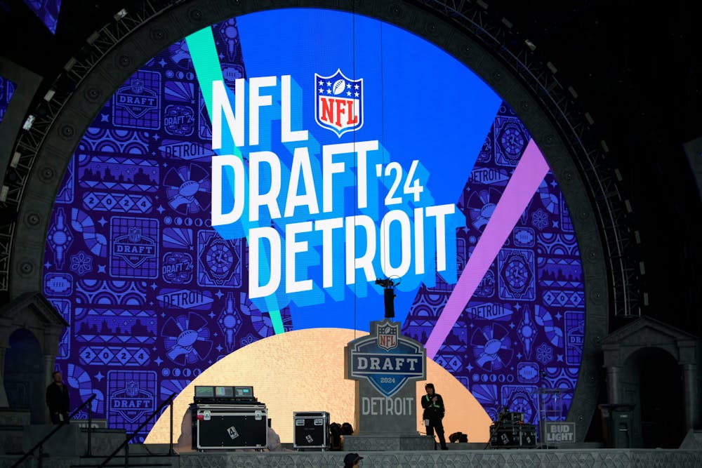 Workers put the finishing touches on the theater and stage for the NFL Draft, in downtown Detroit, April 23, 2024. (David Guralnick/Tribune Content Agency)