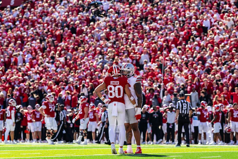 An Ohio State player comforts Indiana's Charlie Becker during Indiana's loss to the Buckeyes on Oct. 17, 2026. (HN photo/Lauren McKinney)