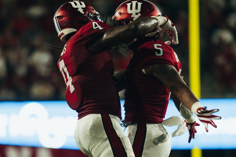 Linebackers Cam Jones (left) and Bradley Jennings, Jr., celebrate during Indiana's win over Illinois on Sept. 2. (HN photo/Max Wood)