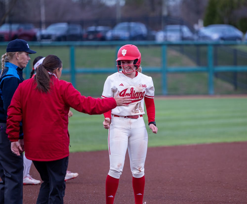 Josie White smiles at third base during Indiana's win over Rutgers on March 13, 2026. (HN photo/Lindsey Soet)