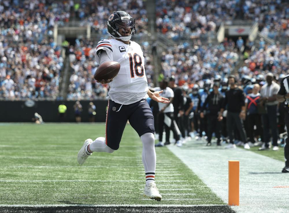 Bears quarterback Caleb Williams runs for a touchdown against the Panthers in the first quarter Sept. 13, 2026, at Bank of America Stadium in Charlotte, N.C. (Brian Cassella/Chicago Tribune/TNS)