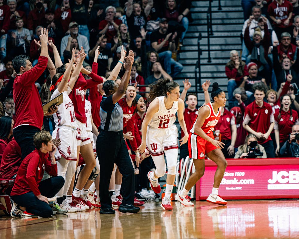 The bench reacts after a shot from Yarden Garzon during Indiana's win over Ohio State on Jan. 26. (HN photo/Cam Schultz)