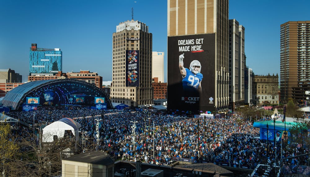 Thousands of football fans wait in downtown Detroit for the 2024 NFL Draft to begin on Thursday, April 25, 2024. (Katy Kildee, The Detroit News)