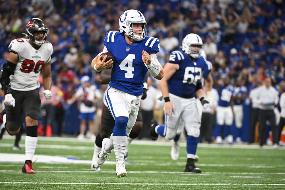 <p>#4 Sam Ehlinger running during a 2022 preseason game against the Tampa Bay Buccaneers. (Photo Courtesy Indianapolis Colts) </p>