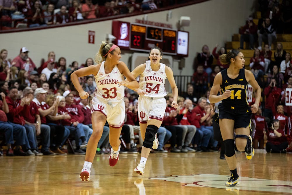 Mackenzie Holmes (54) yells to Sydney Parrish during Indiana's win over Michigan on Jan. 4, 2024. (HN photo/Giselle Marsteller)