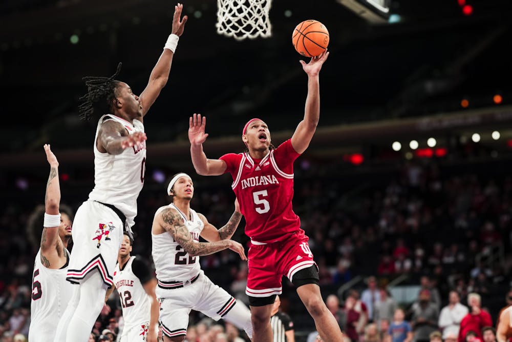 Malik Reneau drives for a layup during Indiana's win over Louisville in the  in the Empire Classic on Nov. 20, 2023. (HN photo/Shrithik Karthik)