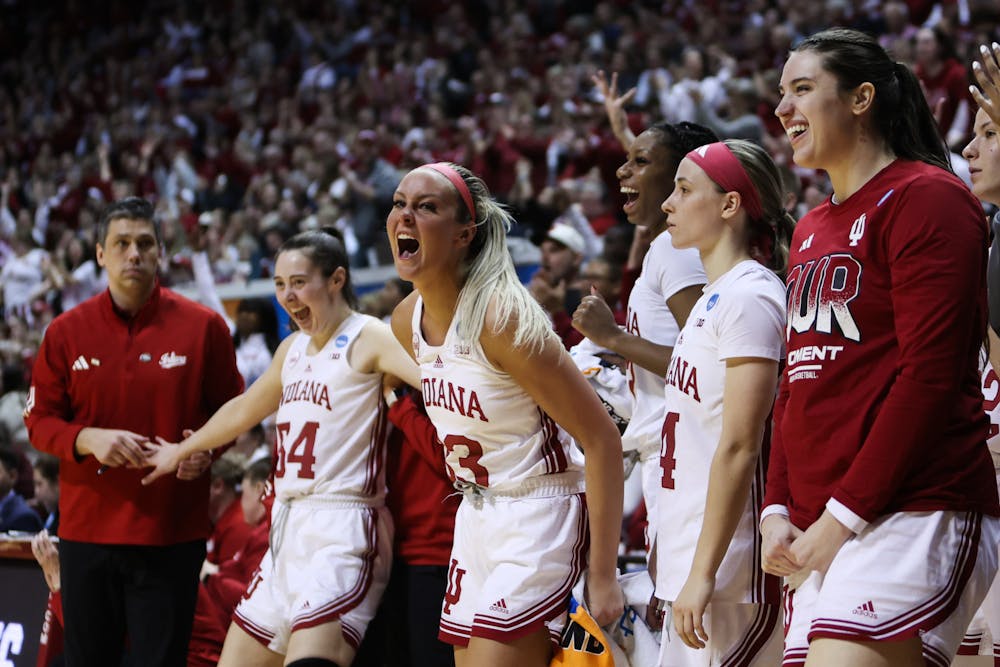 Sydney Parrish (center) and the Indiana bench cheer during Indiana's win over Fairfield in the NCAA Tournament on March 23, 2024. (HN photo/Jaren Himelick)