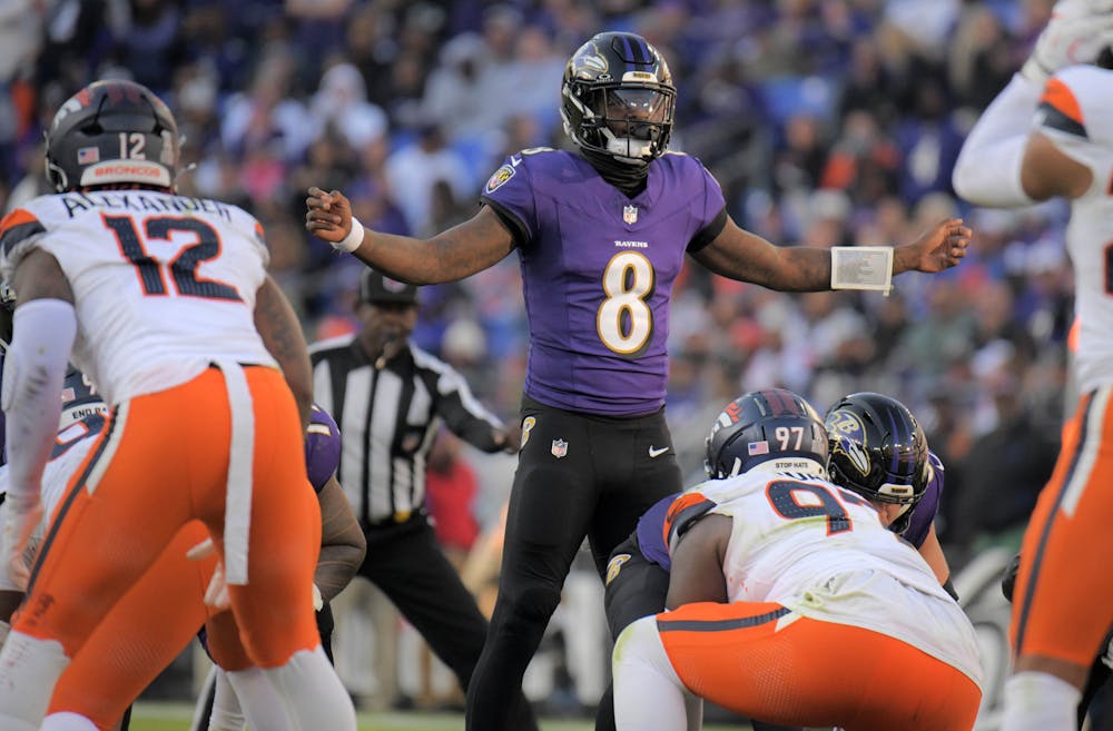 Baltimore Ravens quarterback Lamar Jackson calls an audible against the Denver Broncos during the fourth quarter of NFL football in Baltimore. The Ravens beat the Broncos, 41-10. (Baltimore Sun/TNS)