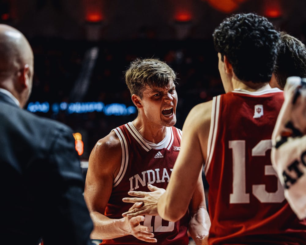 Miller Kopp reacts with teammates during Indiana's win over Illinois on Jan. 19. (HN photo/Cam Schultz)
