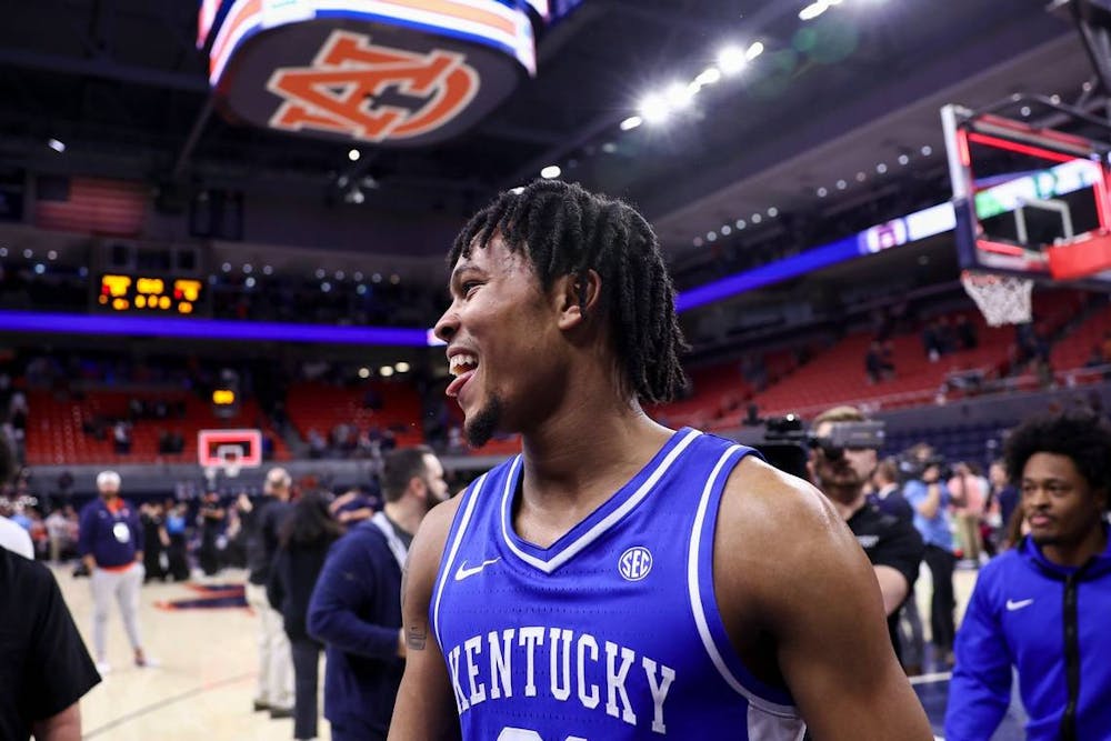 D.J. Wagner (21) and the Kentucky Wildcats knocked off No. 13 Auburn in Neville Arena last weekend. The Tigers had been undefeated at home this season and 45-2 in their last 47 games in the building. (Silas Walker/Tribune Content Agency)