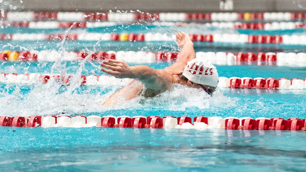 Indiana swimmers compete during Indiana's tri-meet victories against Wisconsin and Louisville on Feb. 2, 2024. (HN photo/Giselle Marsteller)