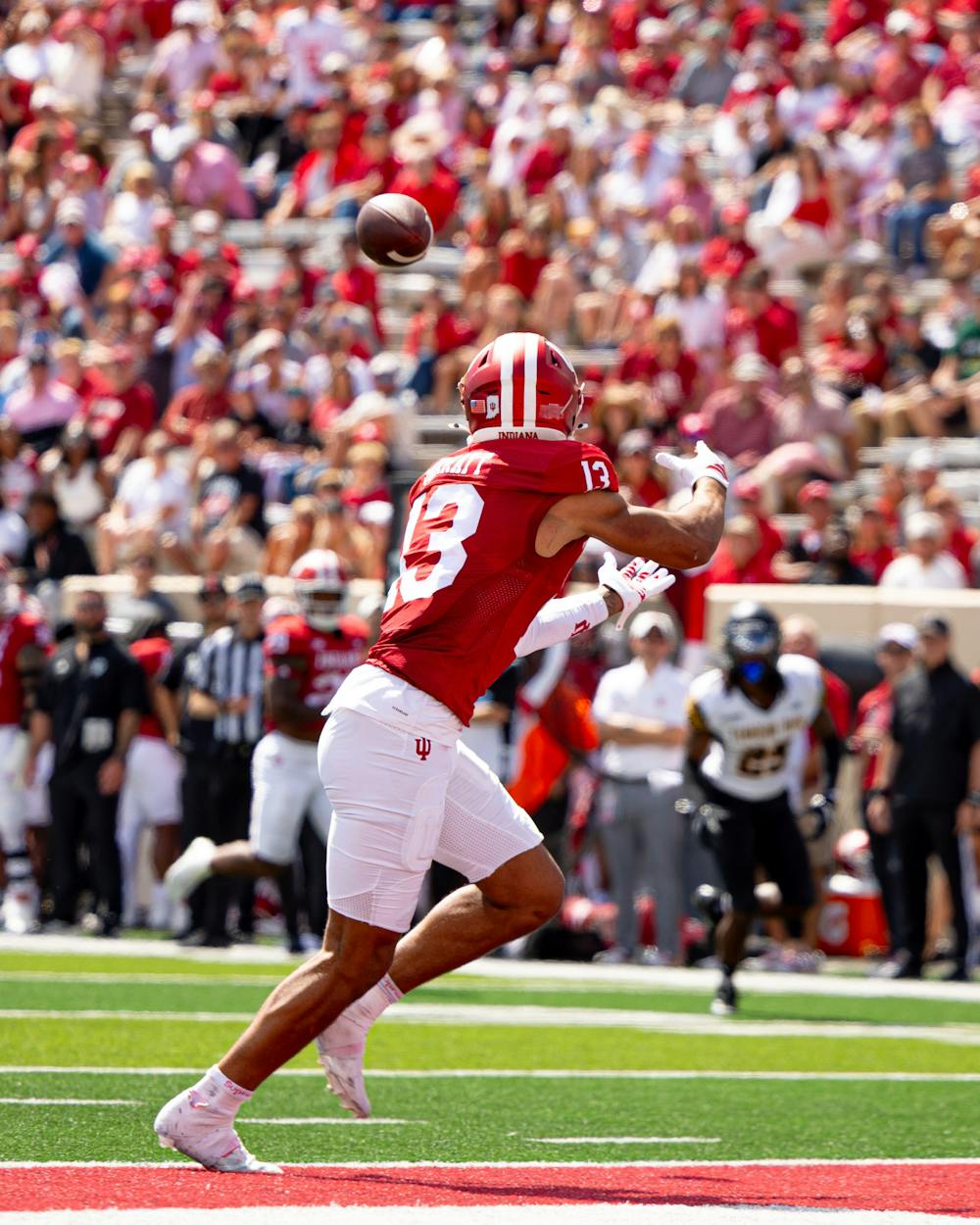<p>Indiana wide receiver Elijah Sarratt catches a touchdown pass from quarterback Fernando Mendoza in Indiana&#x27;s 56-9 win over Kennesaw State on Sept. 6, 2025 (HN photo/Brady Owen). </p>