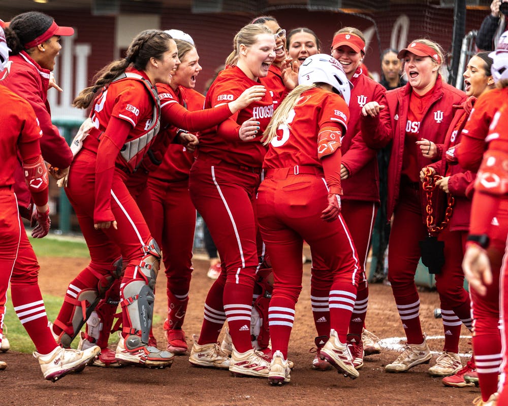 Taylor Minnick (3) celebrates with teammates after hitting a home run during Indiana's win over Valparaiso on March 2, 2024. (HN photo/Giselle Marsteller)