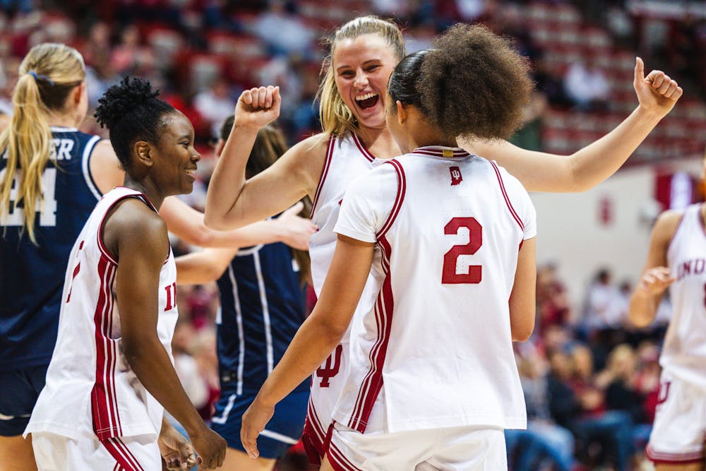 Lenée Beaumont (center) celebrates with teammates during Indiana's win over Butler on Nov. 19, 2025. (HN photo/Kallan Graybill)