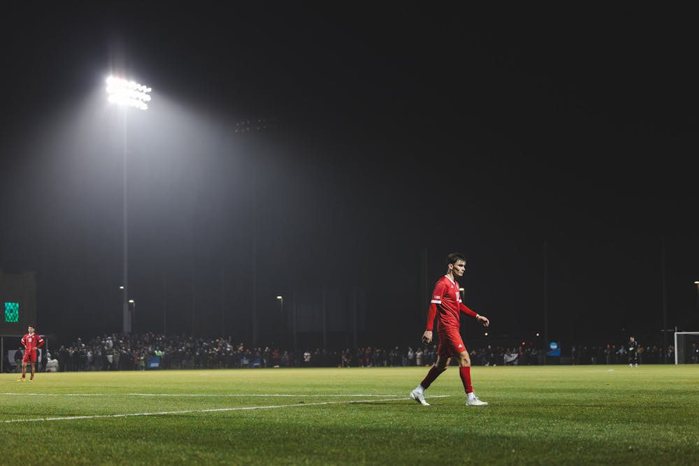 Tommy Mihalic stands under the lights of Alumni Field in South Bend during Indiana's loss to Notre Dame in the Elite Eight on Dec. 2, 2023. (HN photo/Kallan Graybill)