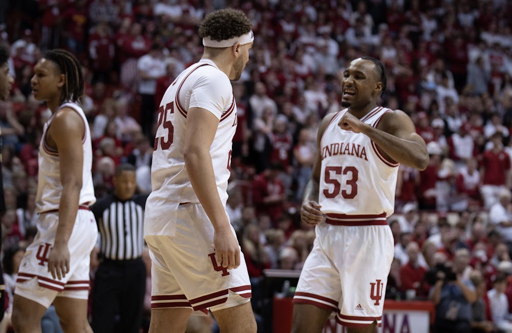 Tamar Bates (right) and Race Thompson celebrate during Indiana's overtime win over Michigan on March 5. (HN photo/Daniel Rodriguez)