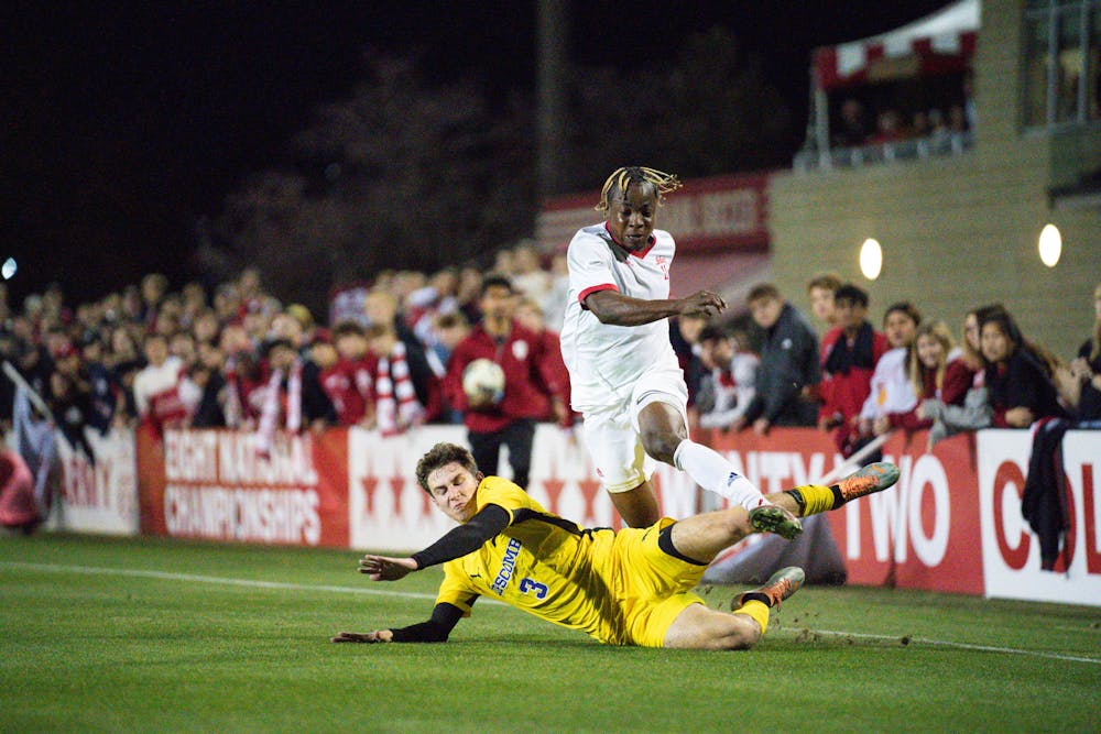 Collins Oduro tries to avoid a tackle during IU's 2-1 win over Lipscomb in the first round the NCAA Tournament on Nov. 16, 2023. (HN photo/Danielle Stockwell)