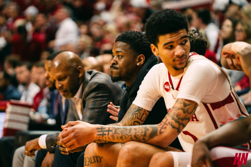 Xavier Johnson (center) watches from the bench during Indiana's loss to Penn State on Feb. 3, 2024. (HN photo/Shrithik Karthik)