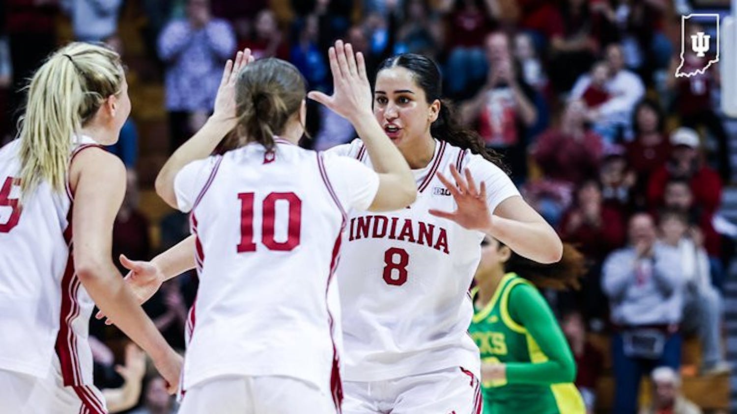 Edessa Noyan and Shay Ciezki embrace during the Hoosiers win