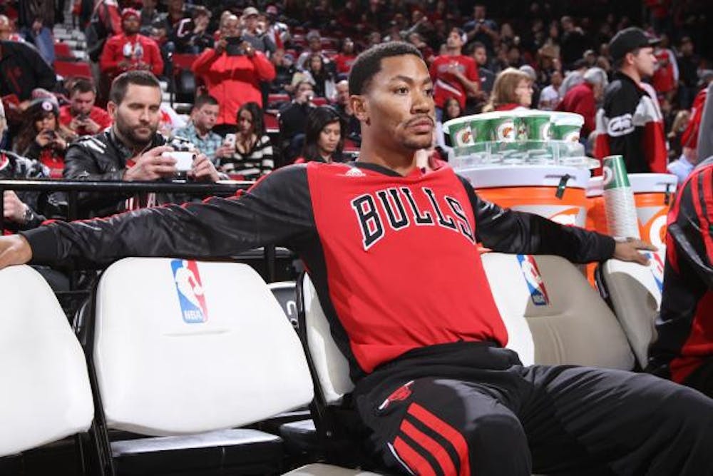 hi-res-457449909-derrick-rose-of-the-chicago-bulls-sits-on-the-bench_crop_north-2-300x200