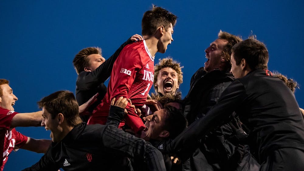 The IU men&#x27;s soccer team celebrates after a 2-0 win over Maryland on April 14 at Bill Armstrong Stadium. IU defeated Seton Hall University 2-0 on Monday to advance to the College Cup.
