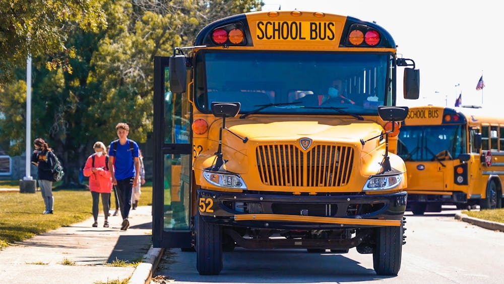 <p>Students board busses at Bloomington High School South on Sept. 13, 2021. The Monroe County Community School Corporation voted to disarm School Resource Officers nearly a year and a half ago in May 2021﻿.</p>