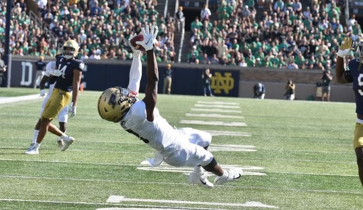 Junior wide receiver David Bell catches a completion. Bell grabbed seven receptions for 64 yards before leaving the game with an apparent concussion.