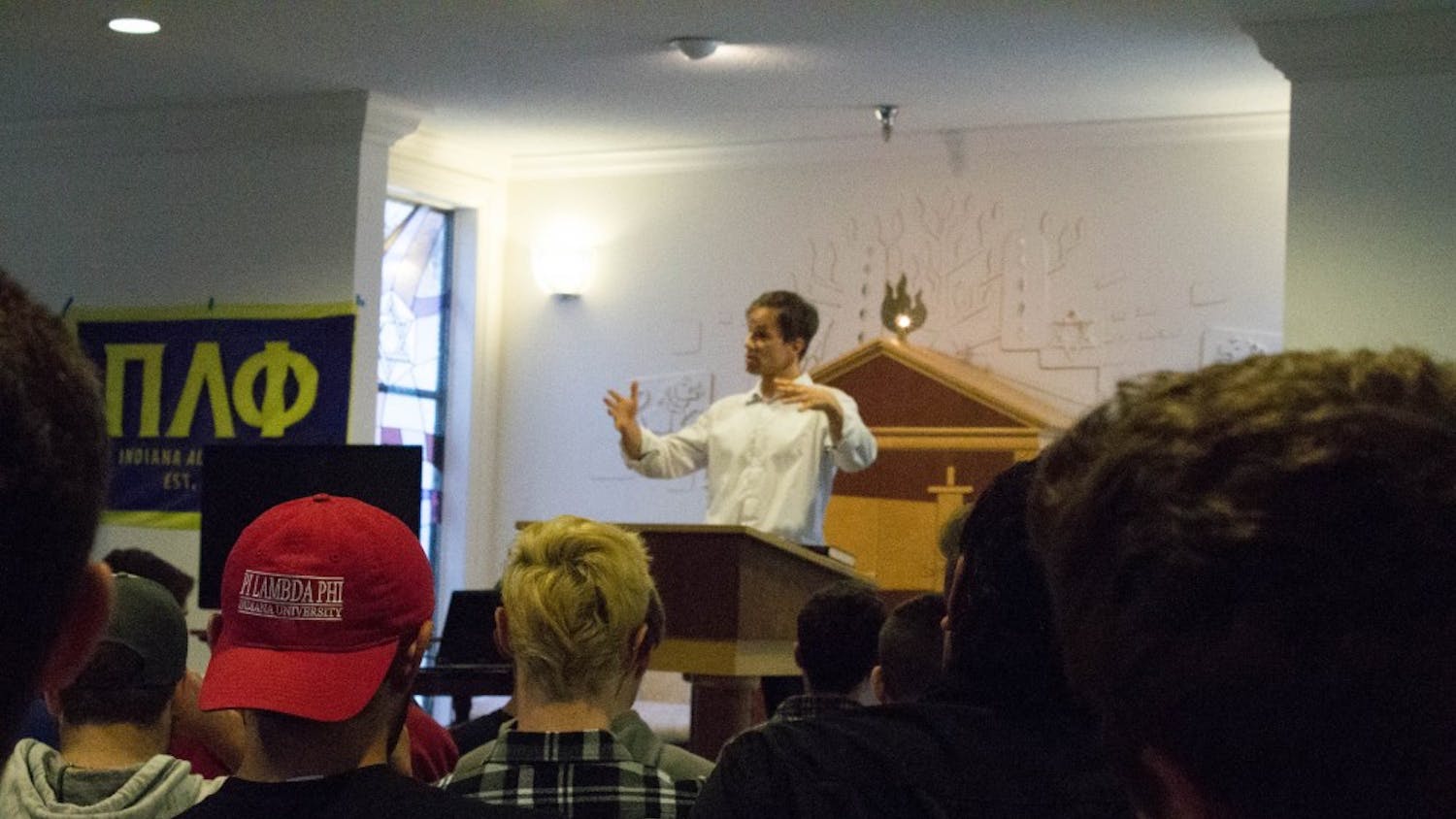 Members of Pi Lambda Phi listen to professor Günther Jikeli give an anti-Semitism speech Oct 16 in the Helene G. Simon Hillel Center.