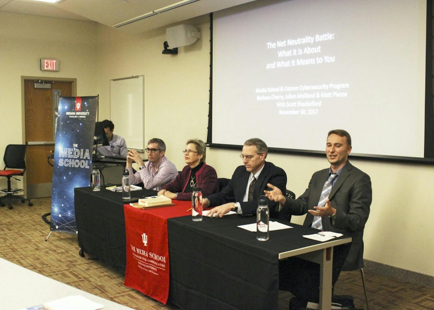 Scott Shackelford introduces the panel on net neutrality with professor Barbara Cherry, assistant professor Julien Mailland and senior lecturer Matt Pierce. The panel was hosted by the Media School and the Ostrom Cybersecurity Program.