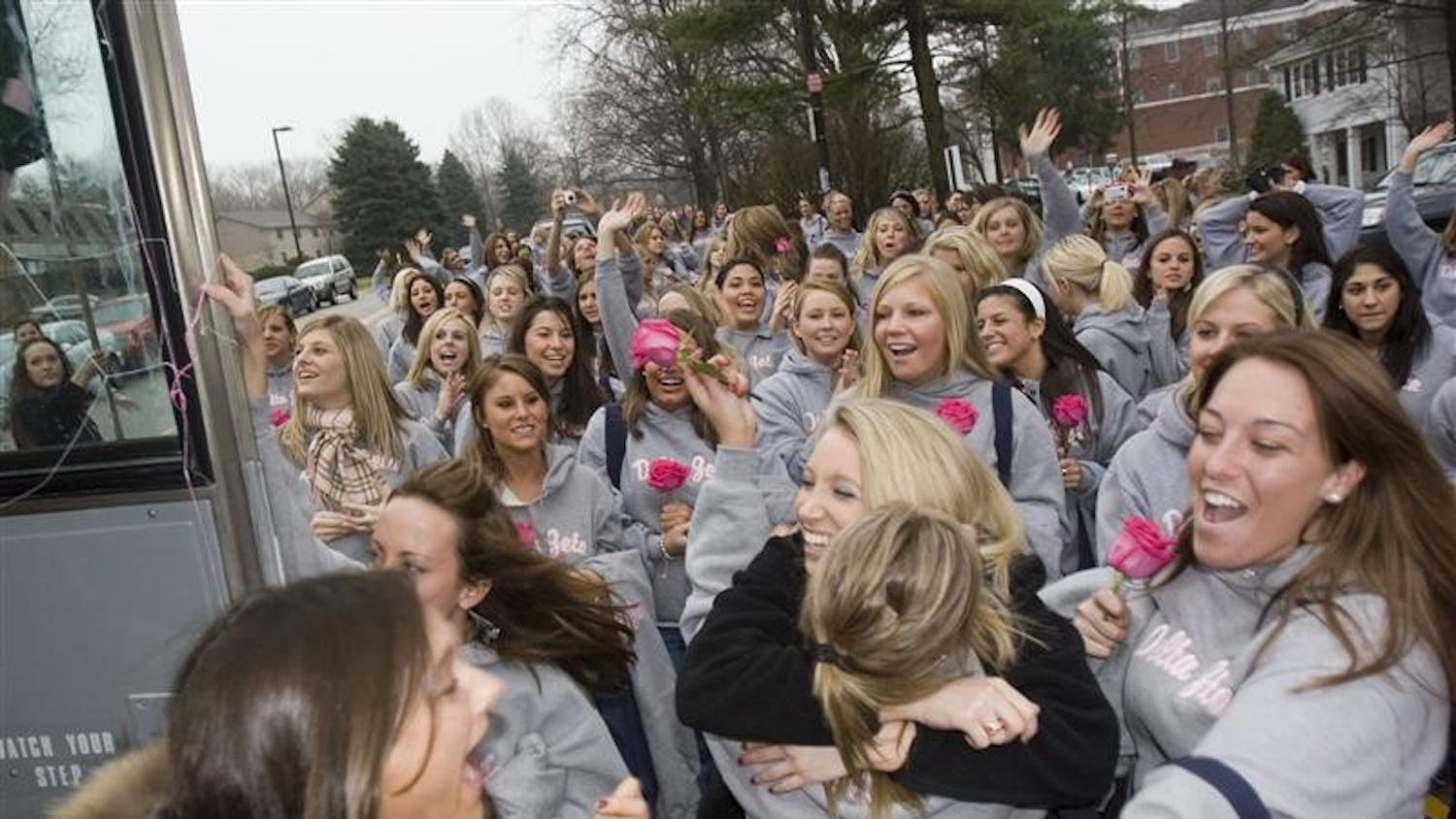 Two new members of Delta Zeta are greated by a sea of sisterhood after stepping off the bus on Jan. 7, 2007 at the sorority house.