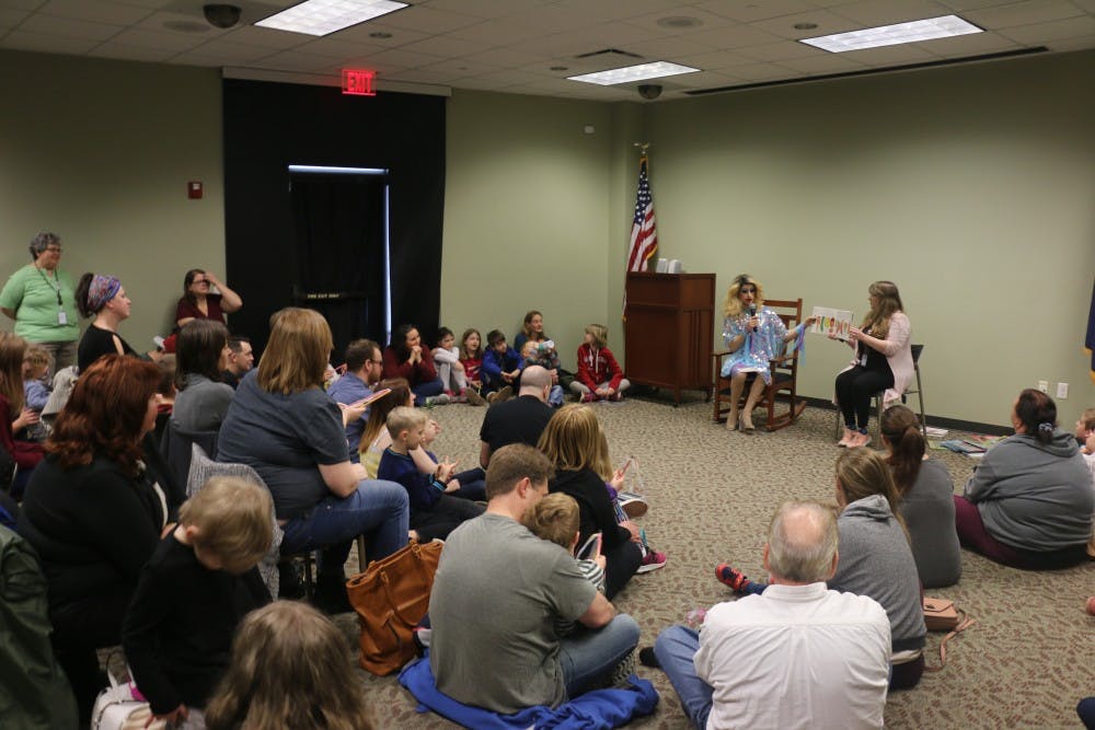 <p>Evansville families in the North Park library listen to Florintine Dawn read &quot;The Very Hungry Caterpillar&quot; on Feb. 23. The reading was part of the city’s first Drag Queen Story Hour.</p>