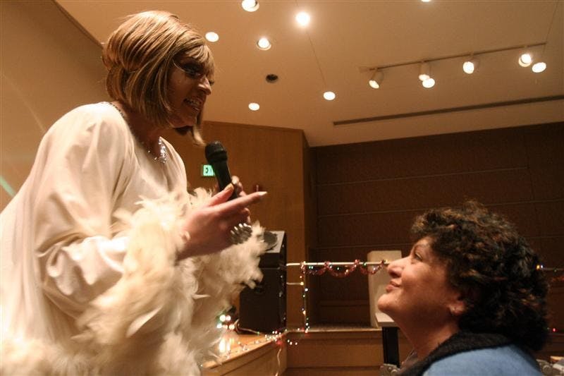 An audience member is speechless during a Sunday night drag queen performance. The event, "Queens who care" raised proceeds for HIV/Aids families for the holiday season.
