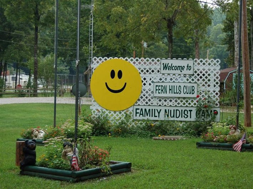 The sign for Fern Hills Club is pictured. From young children to retirees, the club serves as a vacation spot and communal living space for practicing nudists in south central Indiana.