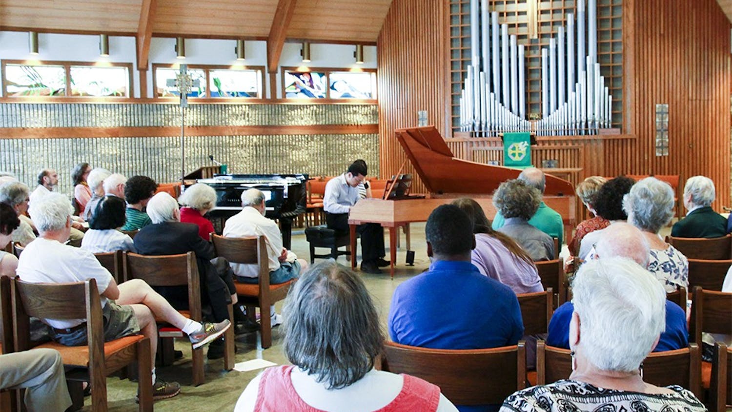 Mike Lee performs on Sunday at the St. Thomas Lutheran Church. This performance was part of the Bloomington Early Music Festival that happened between May 25-29.