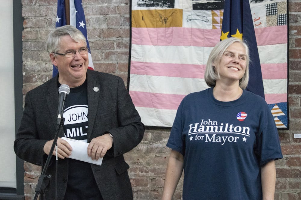 <p>IU law professor Dawn Johnsen and her husband Mayor John Hamilton smile May 7, 2019, at an event at the Dimension Mill. Hamilton will give his seventh State of the City address at 7 p.m. Thursday at the Buskirk-Chumley Theater.</p>