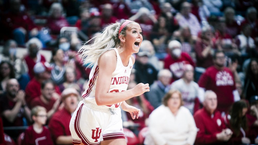 Junior guard Sydney Parish celebrates a three pointer Jan. 12, 2023 at Simon Skjodt Assembly Hall in Bloomington, Indiana. The Hoosiers beat Maryland 68-61.