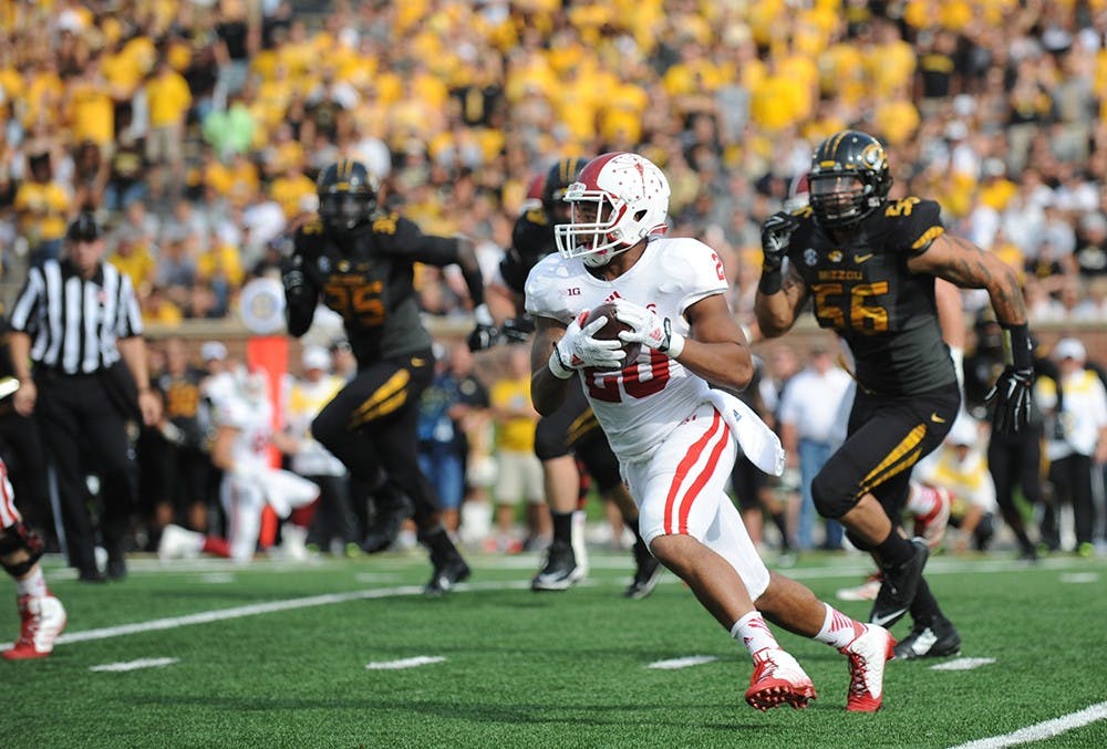 Senior running back D'Angelo Roberts runs during IU's game against Missouri on Saturday in Columbia, Mo. Roberts scored the game-winning touchdown, defeating Missouri 31-27.