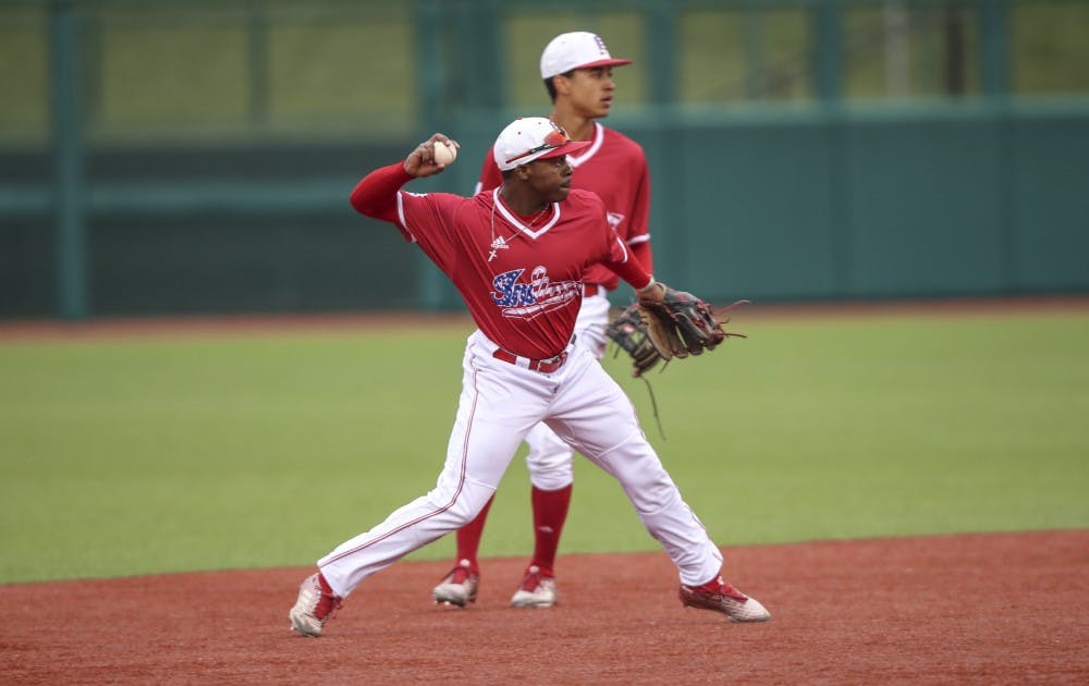 <p>Sophomore Jeremy Houston throws the ball to first for the out during the Hoosiers' game against the Indiana State Sycamores on April 10. IU will face Ohio State this weekend starting Friday.</p>