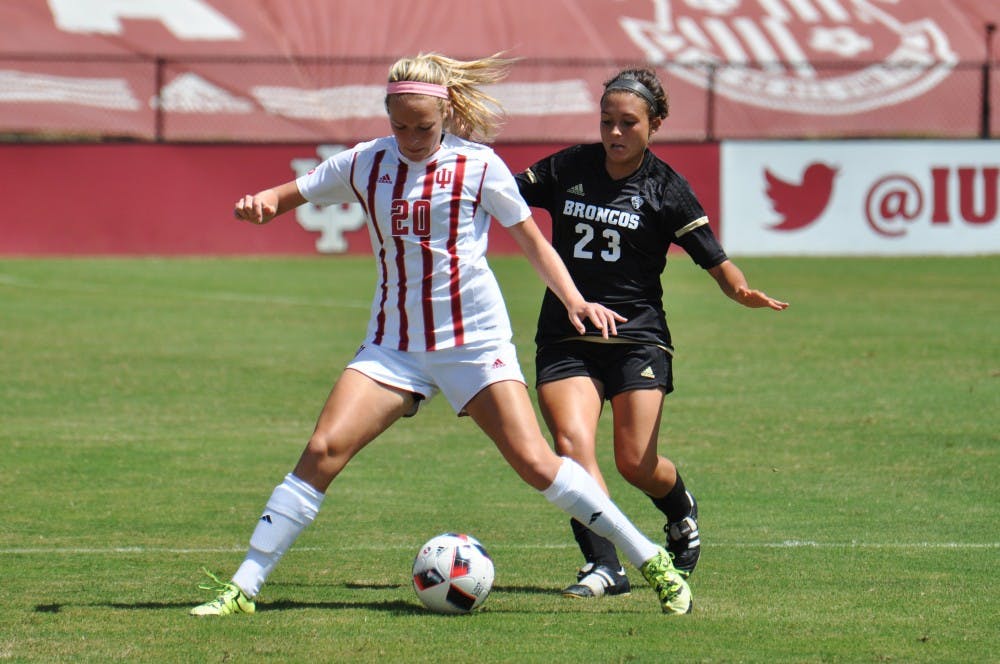 Sophomore defender Caroline Dreher tries to avoid Western Michigan midfielder Tiffany Buckler at Bill Armstrong Stadium on Sunday. IU lost 2-0, giving them an 0-1-1 record after their first weekend of the season.