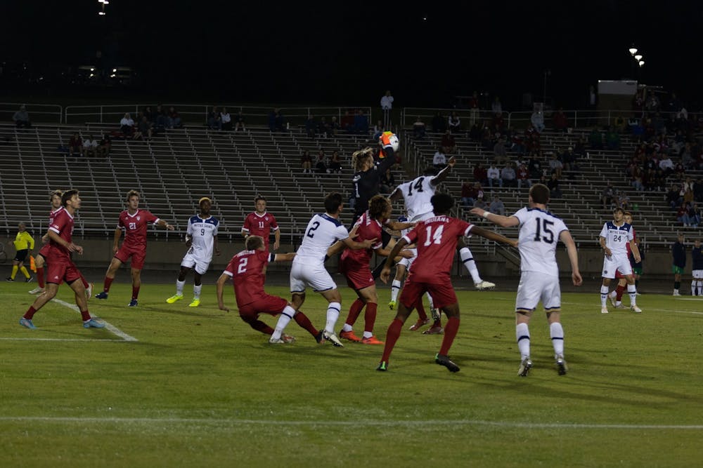 <p>Redshirt senior goalkeeper Bryant Pratt catches a goal attempt against University of Notre Dame Oct. 5, 2022, at Bill Armstrong Stadium. Pratt had one save in the game.</p>