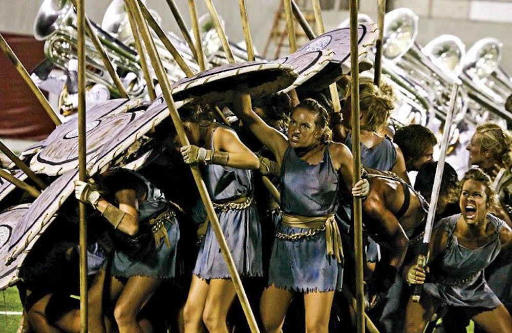 Members of the Phantom Regiment Colorguard prepare to attack the "Emperor" in their performance of "Spartacus."  